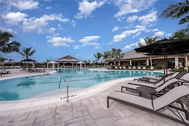 ****SIGNIFICANT PRICE IMPROVEMENT!*** JUST PACK YOUR PERSONAL on The Golf Club At Fiddlers Creek in Florida - for sale on GolfHomes.com, golf home, golf lot