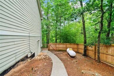 Freshly painted interior and brand-new carpet throughout! Escape on The Highlands Course at Lake Arrowhead in Georgia - for sale on GolfHomes.com, golf home, golf lot