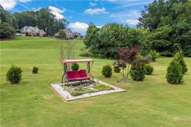 1909 Duncans Mill Ln/Rd is a four-sided brick home in Traditions on Traditions of Braselton Golf Club in Georgia - for sale on GolfHomes.com, golf home, golf lot