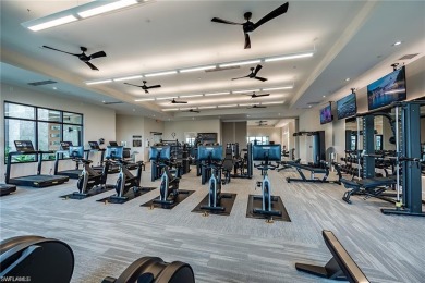 ****SIGNIFICANT PRICE IMPROVEMENT!*** JUST PACK YOUR PERSONAL on The Golf Club At Fiddlers Creek in Florida - for sale on GolfHomes.com, golf home, golf lot