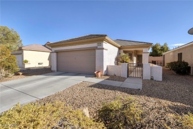 This charming Sun City Anthem home is located close to shopping on Revere Golf Club in Nevada - for sale on GolfHomes.com, golf home, golf lot