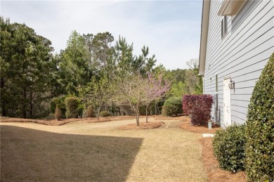 Nestled at the end of a serene cul-de-sac, this charming house on Lanier Island Legacy Golf Couorse in Georgia - for sale on GolfHomes.com, golf home, golf lot