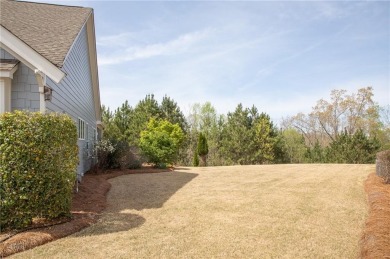 Nestled at the end of a serene cul-de-sac, this charming house on Lanier Island Legacy Golf Couorse in Georgia - for sale on GolfHomes.com, golf home, golf lot
