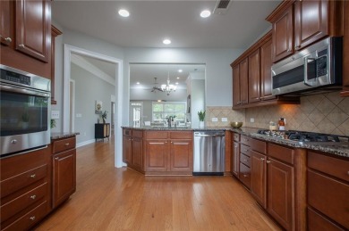 Nestled at the end of a serene cul-de-sac, this charming house on Lanier Island Legacy Golf Couorse in Georgia - for sale on GolfHomes.com, golf home, golf lot