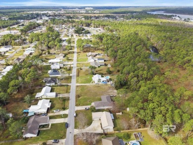 Build your dream home on this large lot located in the heart of on Orange Beach Golf Center in Alabama - for sale on GolfHomes.com, golf home, golf lot