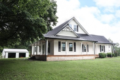 Nestled on 10.74 acres, this charming 1900s farmhouse offers on  in Tennessee - for sale on GolfHomes.com, golf home, golf lot