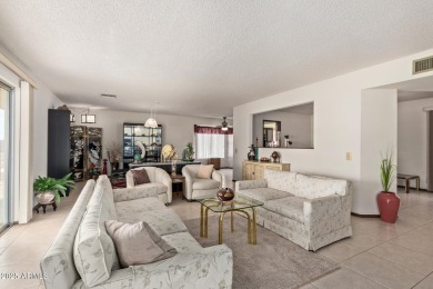 The epitome of comfort nestled within a serene 55+ adult on Stardust Golf Course in Arizona - for sale on GolfHomes.com, golf home, golf lot