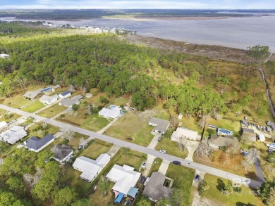 Build your dream home on this large lot located in the heart of on Orange Beach Golf Center in Alabama - for sale on GolfHomes.com, golf home, golf lot