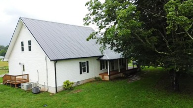 Nestled on 10.74 acres, this charming 1900s farmhouse offers on  in Tennessee - for sale on GolfHomes.com, golf home, golf lot