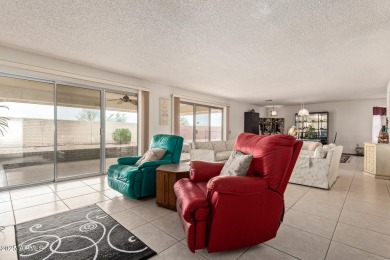 The epitome of comfort nestled within a serene 55+ adult on Stardust Golf Course in Arizona - for sale on GolfHomes.com, golf home, golf lot