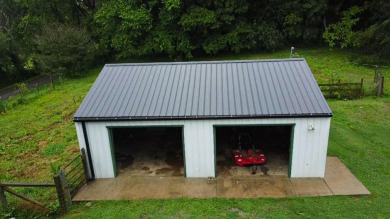 Nestled on 10.74 acres, this charming 1900s farmhouse offers on  in Tennessee - for sale on GolfHomes.com, golf home, golf lot