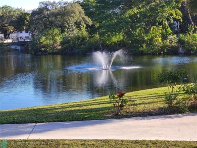 Nested in the highly sough after *The Falls of Inverrary. THIS on Inverrary Country Club in Florida - for sale on GolfHomes.com, golf home, golf lot