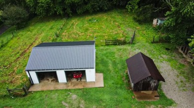 Nestled on 10.74 acres, this charming 1900s farmhouse offers on  in Tennessee - for sale on GolfHomes.com, golf home, golf lot