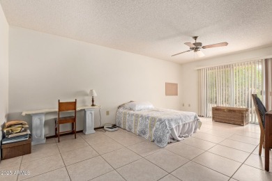 The epitome of comfort nestled within a serene 55+ adult on Stardust Golf Course in Arizona - for sale on GolfHomes.com, golf home, golf lot