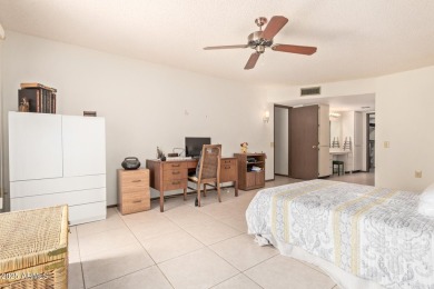 The epitome of comfort nestled within a serene 55+ adult on Stardust Golf Course in Arizona - for sale on GolfHomes.com, golf home, golf lot