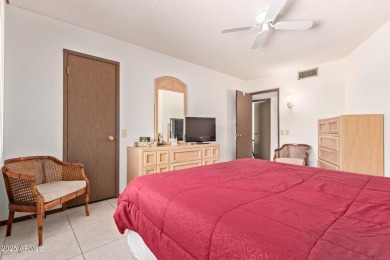 The epitome of comfort nestled within a serene 55+ adult on Stardust Golf Course in Arizona - for sale on GolfHomes.com, golf home, golf lot