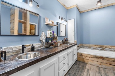 Nestled on 10.74 acres, this charming 1900s farmhouse offers on  in Tennessee - for sale on GolfHomes.com, golf home, golf lot
