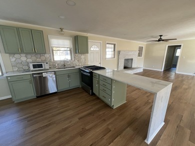 Discover this beautifully updated brick ranch, perfectly on Goshen Plantation Golf Club in Georgia - for sale on GolfHomes.com, golf home, golf lot