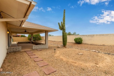 The epitome of comfort nestled within a serene 55+ adult on Stardust Golf Course in Arizona - for sale on GolfHomes.com, golf home, golf lot