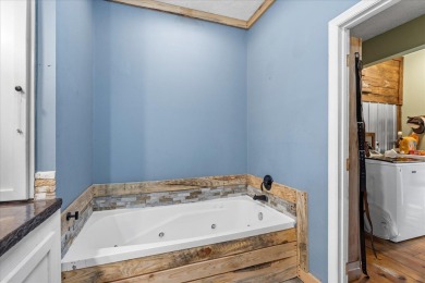 Nestled on 10.74 acres, this charming 1900s farmhouse offers on  in Tennessee - for sale on GolfHomes.com, golf home, golf lot