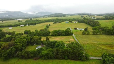 Nestled on 10.74 acres, this charming 1900s farmhouse offers on  in Tennessee - for sale on GolfHomes.com, golf home, golf lot