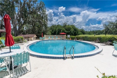 Wake up to stunning views of Jade Lake, the 11th Green of the on Country Club At Silver Springs Shores in Florida - for sale on GolfHomes.com, golf home, golf lot