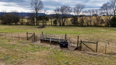 Nestled on 10.74 acres, this charming 1900s farmhouse offers on  in Tennessee - for sale on GolfHomes.com, golf home, golf lot