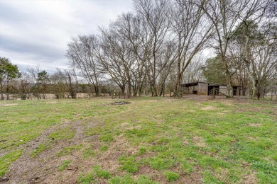 Nestled on 10.74 acres, this charming 1900s farmhouse offers on  in Tennessee - for sale on GolfHomes.com, golf home, golf lot