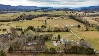 Nestled on 10.74 acres, this charming 1900s farmhouse offers on  in Tennessee - for sale on GolfHomes.com, golf home, golf lot