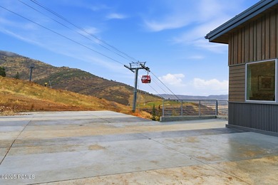 Relish this prime perch in Canyons Village, where genuine ski-in on Canyons Golf Course in Utah - for sale on GolfHomes.com, golf home, golf lot