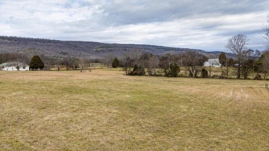 Nestled on 10.74 acres, this charming 1900s farmhouse offers on  in Tennessee - for sale on GolfHomes.com, golf home, golf lot