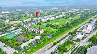 55+ COMMUNITY, BEAUTIFUL AND VERY TASTEFUL DECORATED UNIT, WITH on Ocean Breeze Golf and Country Club in Florida - for sale on GolfHomes.com, golf home, golf lot