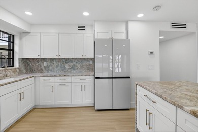 A very rare opportunity to own a first floor waterfront Isle of on Kings Point Golf -Flanders Way in Florida - for sale on GolfHomes.com, golf home, golf lot