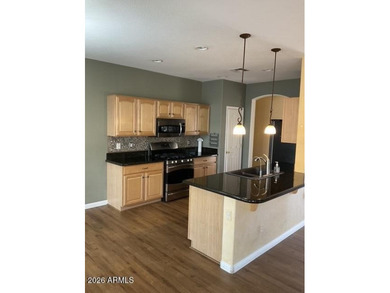 Enjoy Resort-Style Living in the Sought-After Golf Course on Lone Tree Golf Club in Arizona - for sale on GolfHomes.com, golf home, golf lot