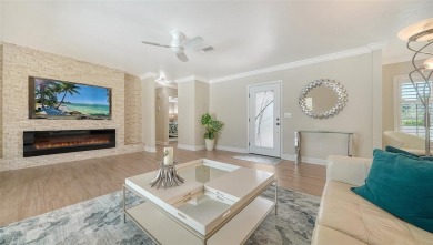 Gorgeously updated and hurricane-ready, this lakefront pool home on The Meadows Golf and Country Club in Florida - for sale on GolfHomes.com, golf home, golf lot