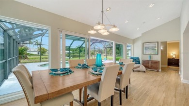 Gorgeously updated and hurricane-ready, this lakefront pool home on The Meadows Golf and Country Club in Florida - for sale on GolfHomes.com, golf home, golf lot