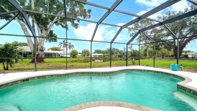 Gorgeously updated and hurricane-ready, this lakefront pool home on The Meadows Golf and Country Club in Florida - for sale on GolfHomes.com, golf home, golf lot