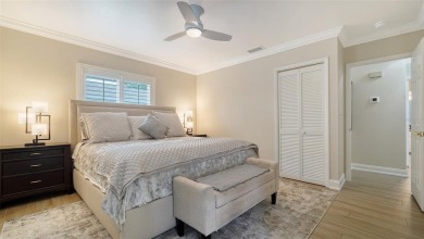 Gorgeously updated and hurricane-ready, this lakefront pool home on The Meadows Golf and Country Club in Florida - for sale on GolfHomes.com, golf home, golf lot