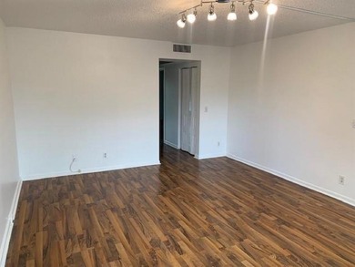 Beautiful corner unit featuring 2 bedrooms and 2 bathrooms with on Flamingo Lakes Country Club in Florida - for sale on GolfHomes.com, golf home, golf lot