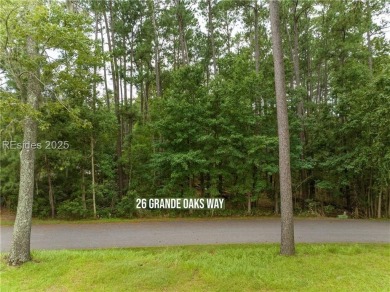 Large wooded lot located in Pleasant Point Plantation situated on The Golf Club at Pleasant Point Plantation in South Carolina - for sale on GolfHomes.com, golf home, golf lot