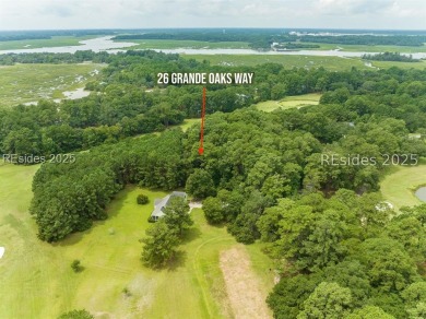 Large wooded lot located in Pleasant Point Plantation situated on The Golf Club at Pleasant Point Plantation in South Carolina - for sale on GolfHomes.com, golf home, golf lot