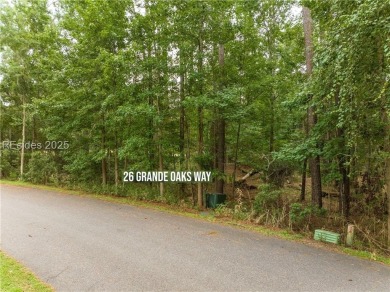Large wooded lot located in Pleasant Point Plantation situated on The Golf Club at Pleasant Point Plantation in South Carolina - for sale on GolfHomes.com, golf home, golf lot