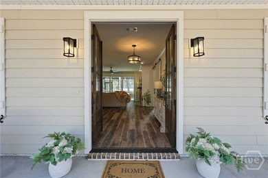 Experience Luxury Low-Country Living in this Beautifully Built on Sapelo Hammock Golf Club in Georgia - for sale on GolfHomes.com, golf home, golf lot