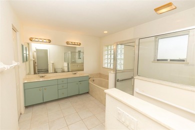 COURTYARD HOME W/ PRIVATE IN-LAW SUITE & NEW TILE ROOF WITH on Rotonda Golf and Country Club The Links Course in Florida - for sale on GolfHomes.com, golf home, golf lot