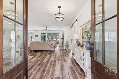 Experience Luxury Low-Country Living in this Beautifully Built on Sapelo Hammock Golf Club in Georgia - for sale on GolfHomes.com, golf home, golf lot