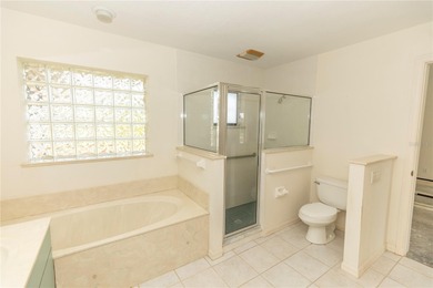 COURTYARD HOME W/ PRIVATE IN-LAW SUITE & NEW TILE ROOF WITH on Rotonda Golf and Country Club The Links Course in Florida - for sale on GolfHomes.com, golf home, golf lot