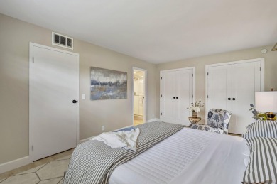 Enjoy serene water views from this fully remodeled ground-floor on Kings Point Golf - Executive in Florida - for sale on GolfHomes.com, golf home, golf lot
