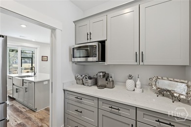 Experience Luxury Low-Country Living in this Beautifully Built on Sapelo Hammock Golf Club in Georgia - for sale on GolfHomes.com, golf home, golf lot