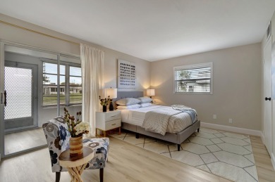 Enjoy serene water views from this fully remodeled ground-floor on Kings Point Golf - Executive in Florida - for sale on GolfHomes.com, golf home, golf lot