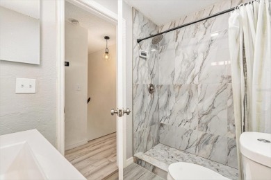 PRICE CORRECTION!!! Sleek  Sophisticated 2-Bed, 1.5-Bath on Cove Cay Country Club in Florida - for sale on GolfHomes.com, golf home, golf lot